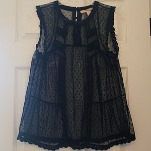 A sleeveless sheer Forever 21 top